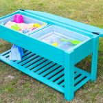 Learn how to make a fun DIY sand and water table for your kiddos! The perfect summer project that keeps your little ones playing outside. Free building plans by Jen Woodhouse