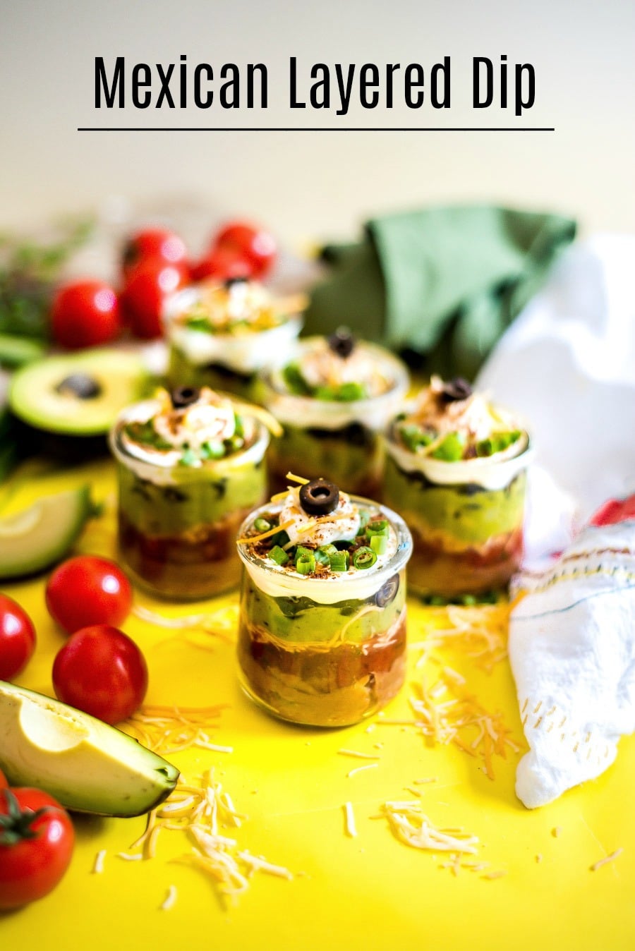 This Mexican Layered Dip is so easy to make and it will please your party for sure!