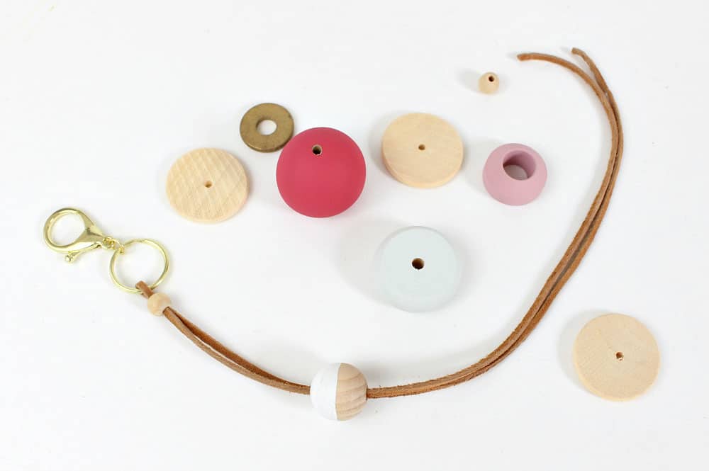 assembling wood and leather bag tassel