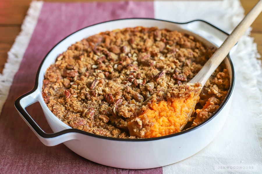 The BEST sweet potato casserole recipe! Creamy and rich sweet potatoes with a crumbly brown sugar pecan crust!