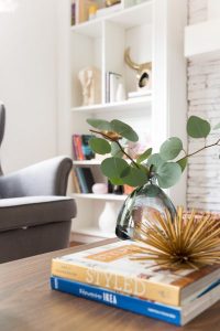 stacked books styled on coffee table