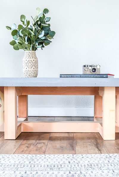 How to make a DIY coffee table with a concrete top. Free plans by Jen Woodhouse