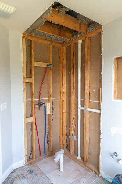 Guest bathroom renovation plumbing rough-in and floor leveling