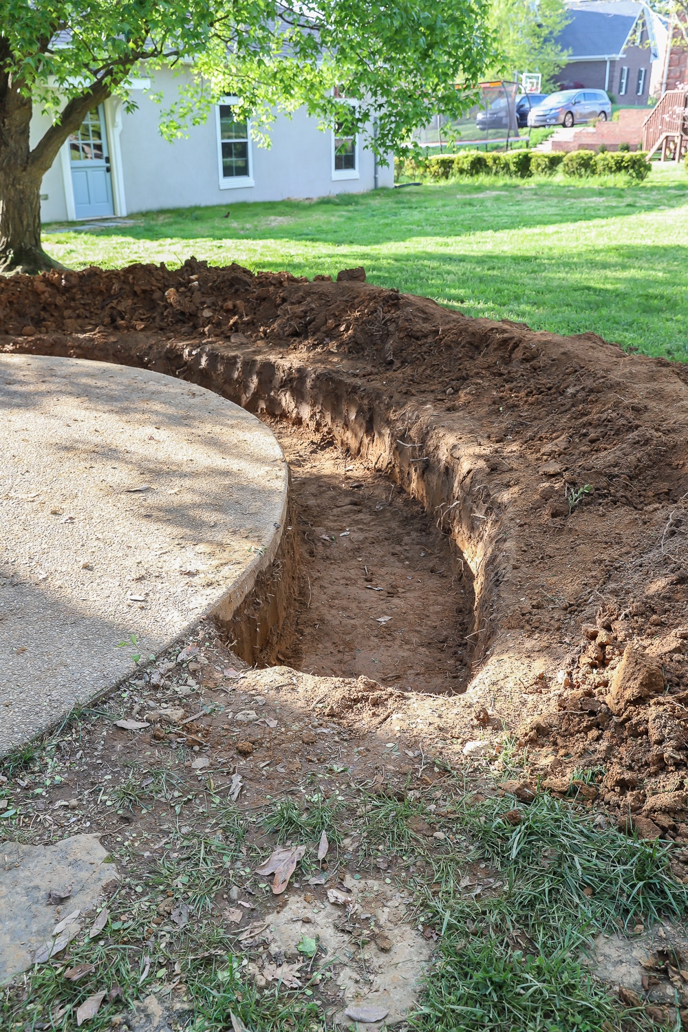 Digging for the concrete footer for our outdoor fireplace
