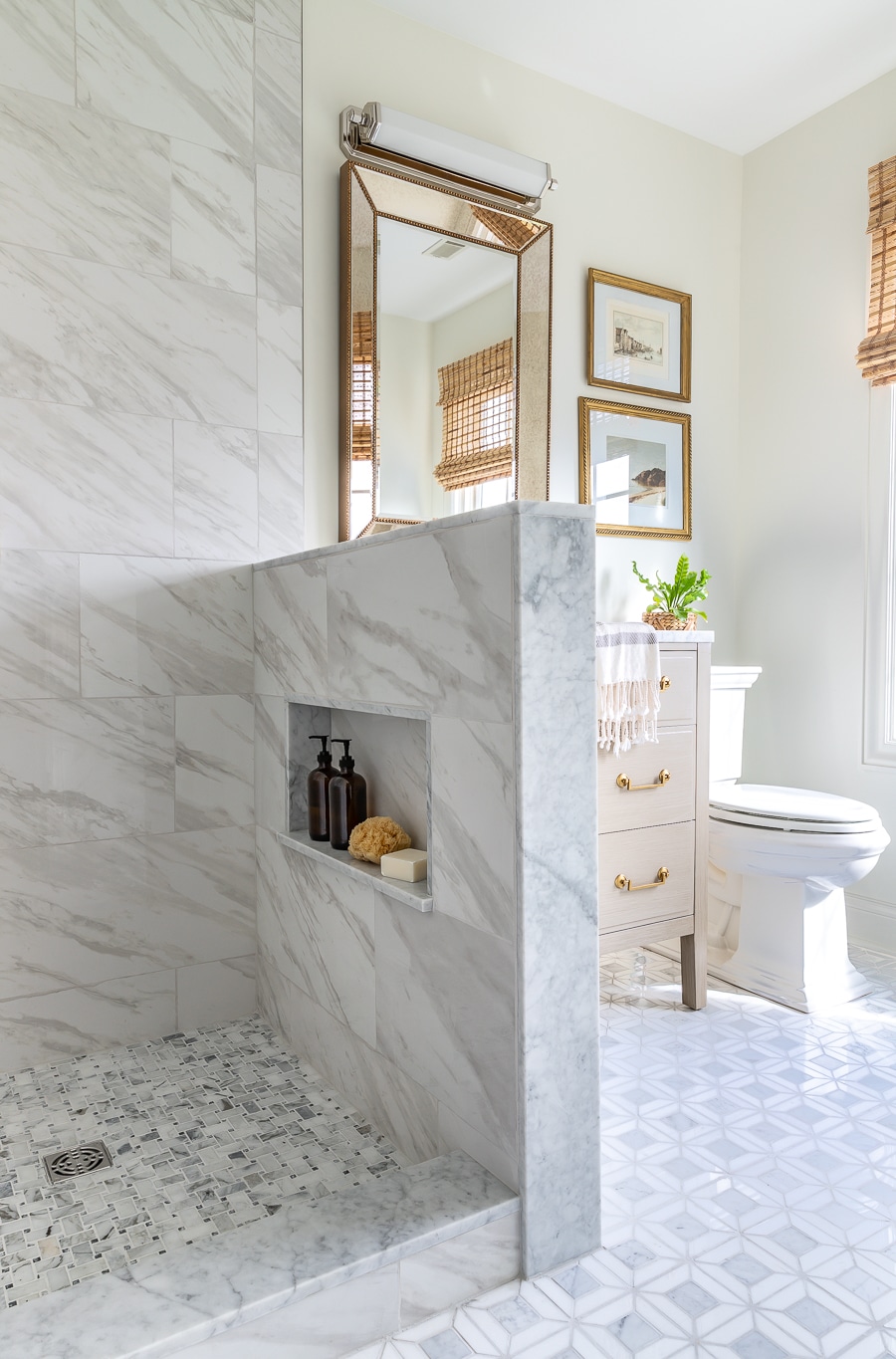 small bathroom renovation with marble mosaic tile and large format tile