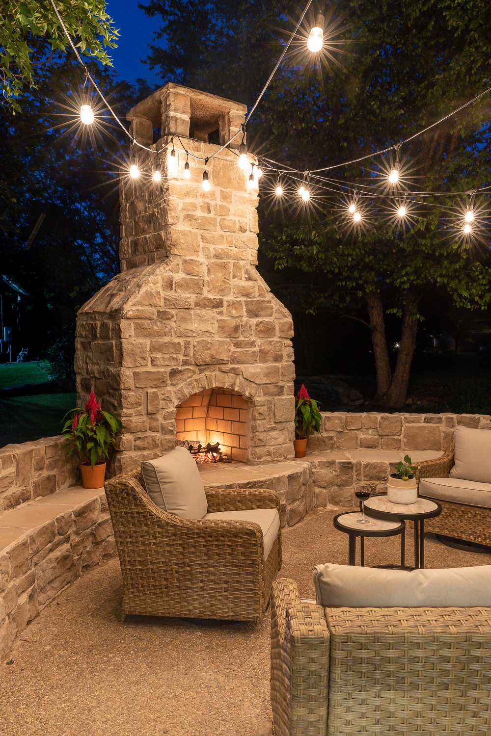 Outdoor fireplace with curved bench seating