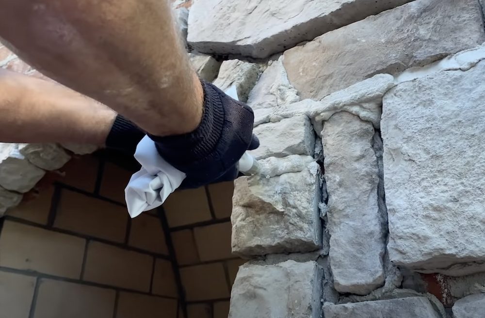 Over-grouting technique for stone veneer