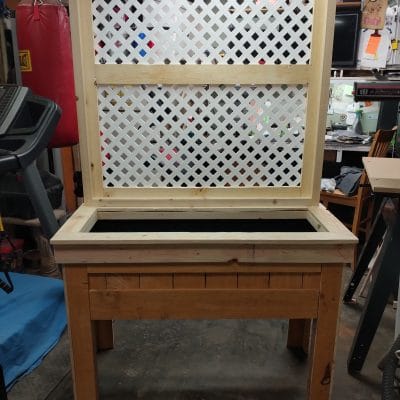 Raised planter with trellis